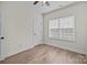 Bedroom showing new floors, a window with new blinds and a door at 910 Pine Knoll Rd # 13, Fort Mill, SC 29715