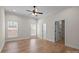 Spacious bedroom featuring a fan, natural light, and access to closet and bathroom at 910 Pine Knoll Rd # 13, Fort Mill, SC 29715