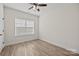 Bedroom showing new floors and a window with new blinds at 910 Pine Knoll Rd # 13, Fort Mill, SC 29715