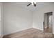 Bedroom showing new floors and baseboards and a door leading to a closet or bathroom at 910 Pine Knoll Rd # 13, Fort Mill, SC 29715
