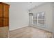 Bright breakfast nook bathed in natural light with modern lighting fixture at 910 Pine Knoll Rd # 13, Fort Mill, SC 29715