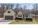 Charming single-Gathering home features a covered front porch, attached two car garage, and manicured lawn at 910 Pine Knoll Rd # 13, Fort Mill, SC 29715