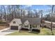 Inviting single-Gathering home showcasing a well-manicured lawn, attached garage, and a welcoming porch at 910 Pine Knoll Rd # 13, Fort Mill, SC 29715
