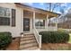 Charming front entrance features brick steps, a cozy porch, and a classic black door at 910 Pine Knoll Rd # 13, Fort Mill, SC 29715