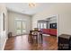 Bright dining room with hardwood floors, flooded with natural light and easy access to outdoors at 9433 Wallace Pond Dr, Huntersville, NC 28078
