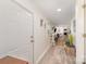 Entryway featuring neutral paint, laminate flooring, open floor plan, and a welcoming ambiance at 9937 Harwood Ln, Charlotte, NC 28214