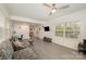 Bright living room with laminate flooring, a large window and an open floor plan at 9937 Harwood Ln, Charlotte, NC 28214