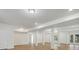 Finished basement featuring an open layout, stylish laminate flooring, and ample natural light at 1033 Ridge Haven Rd, Waxhaw, NC 28173