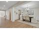 Open-concept dining room featuring modern decor and ample natural light, adjacent to butler's pantry at 1033 Ridge Haven Rd, Waxhaw, NC 28173
