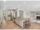 Open kitchen featuring granite countertops, an island, stainless steel appliances, and recessed lighting at 1033 Ridge Haven Rd, Waxhaw, NC 28173