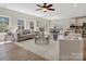 Open-concept living room seamlessly connects to the kitchen and dining areas, perfect for entertaining at 1033 Ridge Haven Rd, Waxhaw, NC 28173