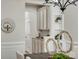 Butler's pantry features stylish cabinetry, granite counters, and beverage center at 1033 Ridge Haven Rd, Waxhaw, NC 28173