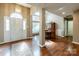 Elegant dining room featuring a decorative chandelier, and beautiful hardwood floors at 108 Vermillion Loop, Statesville, NC 28625