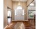 Inviting foyer featuring tall ceilings, beautiful hardwood floors, and ample natural light at 108 Vermillion Loop, Statesville, NC 28625