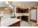 Kitchen island with breakfast bar, stainless steel appliances, and a view of the kitchen and eating nook at 108 Vermillion Loop, Statesville, NC 28625