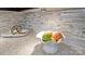 White marble counter tops with a decorative backsplash and bowl of fruit at 108 Vermillion Loop, Statesville, NC 28625