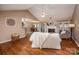 Bright living room featuring a fireplace, hardwood floors, and an open layout at 108 Vermillion Loop, Statesville, NC 28625