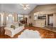 Spacious living room with hardwood floors and easy access to kitchen and dining areas at 108 Vermillion Loop, Statesville, NC 28625