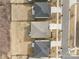 Aerial view of suburban homes showing roof lines, driveways and adjacent yards at 11518 Solstice Way, Huntersville, NC 28078
