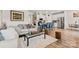 Open living space showcasing modern kitchen, comfortable seating, and seamless flow for easy living and entertaining at 11518 Solstice Way, Huntersville, NC 28078