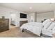 Spacious primary bedroom with adjoining bathroom and a comfortable bed at 11518 Solstice Way, Huntersville, NC 28078