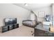 Angled ceiling bedroom with a daybed, desk, and entertainment center offering flexible space at 1246 Rising Oak Dr, Charlotte, NC 28206
