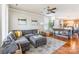 Comfortable living room with a large gray sectional, hardwood floors, and stylish decor at 1246 Rising Oak Dr, Charlotte, NC 28206