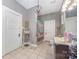 Bathroom with tiled floors, charming decor, and ample lighting at 1386 Jennings Rd, Statesville, NC 28625