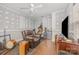 Bedroom featuring hardwood floors, a ceiling fan, and neutral paint at 1386 Jennings Rd, Statesville, NC 28625