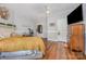 Bedroom featuring hardwood floors, natural light, and neutral paint at 1386 Jennings Rd, Statesville, NC 28625