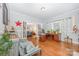 Versatile room perfect for an office featuring hardwood floors, natural light, and access to other rooms at 1386 Jennings Rd, Statesville, NC 28625
