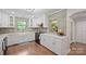 Kitchen featuring updated appliances, custom backsplash, and ample counter space at 1755 Simplicity Rd, Concord, NC 28025