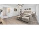 Main bedroom with a ceiling fan and en-suite bathroom at 1803 Country Club Rd, Lincolnton, NC 28092