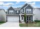 Charming two-story home features a well-manicured lawn, inviting curb appeal, and a classic architectural style at 1809 Country Club Rd, Lincolnton, NC 10757