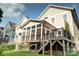 Rear exterior showcasing deck with stairs leading to backyard at 1905 Summey Ave, Charlotte, NC 28205