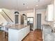 Modern kitchen with stainless steel appliances, granite countertops, and hardwood floors at 1905 Summey Ave, Charlotte, NC 28205