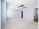 Large bedroom with plush carpet and ensuite bathroom at 2021 Lennox Square Rd, Charlotte, NC 28210