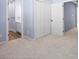 Bedroom with carpet, closet and partial bathroom view at 2021 Lennox Square Rd, Charlotte, NC 28210