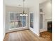 Cozy dining area with hardwood floors and large windows overlooking backyard at 2068 Brandt Rd, York, SC 29745