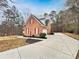 Beautiful home featuring a long driveway, well-maintained landscaping, and a two-car garage at 2068 Brandt Rd, York, SC 29745