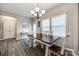 Cozy dining area with wood floors, natural light, and a view to the backyard at 2076 Brightflower Ln, York, SC 29745