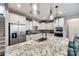 Modern kitchen features granite countertops, stainless steel appliances, and ample cabinet space at 2076 Brightflower Ln, York, SC 29745