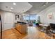 Open living space with modern kitchen, dining area, and city views at 210 N Church St # 1413, Charlotte, NC 28202