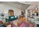 Cozy living room merges with a modern kitchen, bar seating, and decor at 210 N Church St # 1413, Charlotte, NC 28202