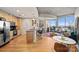 Bright condo with kitchen and open concept living area and city views at 210 N Church St # 1413, Charlotte, NC 28202