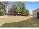 Expansive backyard with mature trees offers ample space for outdoor activities at 2177 Galloway Sw Ln, Concord, NC 28025