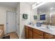 Bathroom features a double sink vanity and tile flooring at 2177 Galloway Sw Ln, Concord, NC 28025