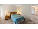 Comfortable bedroom featuring nightstands and a plush carpet at 2177 Galloway Sw Ln, Concord, NC 28025