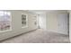 Well-lit bedroom with plush carpet flooring and lots of natural light at 2177 Galloway Sw Ln, Concord, NC 28025
