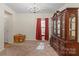 Dining room showcases a beautiful antique china cabinet and a charming chandelier at 2177 Galloway Sw Ln, Concord, NC 28025